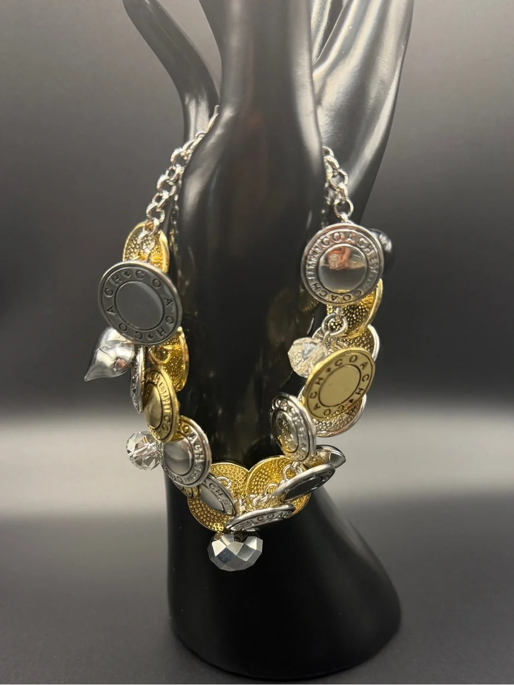 Coach vintage Two-Tone Coin Charm Bracelet in Gold and Silver